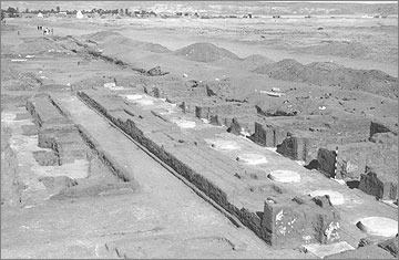 Excavation photograph (1934) of the sunken garden of the northern section of the ‘Harem Quarter’ of the Great Palace, viewed to the north-east. The small chambers behind a columned portico are on the right