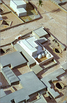 Detail of the model of the housing area of the Main City at Amarna. Note the circular granaries with domed tops, the upper floors of the house, and the wells